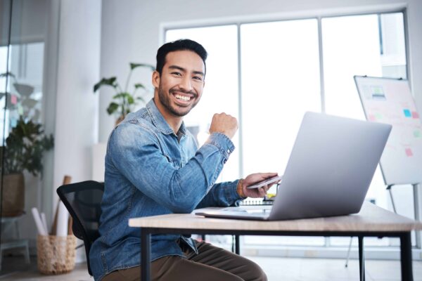 business man laptop and smile in startup office 2025 04 06 10 16 26 utc 1